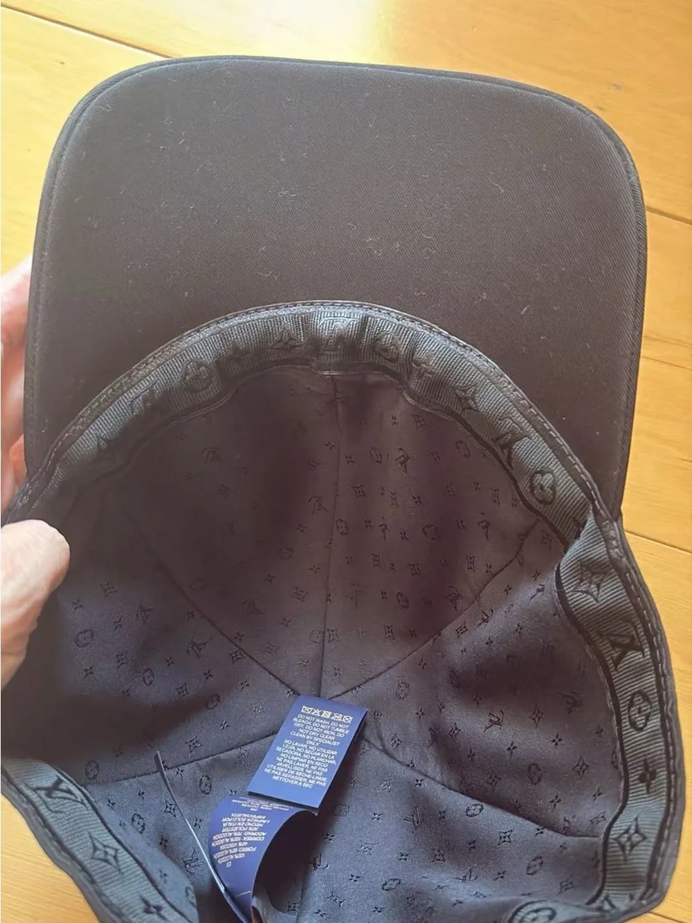 Louis Vuitton Black Baseball Cap with Gold LV Accent